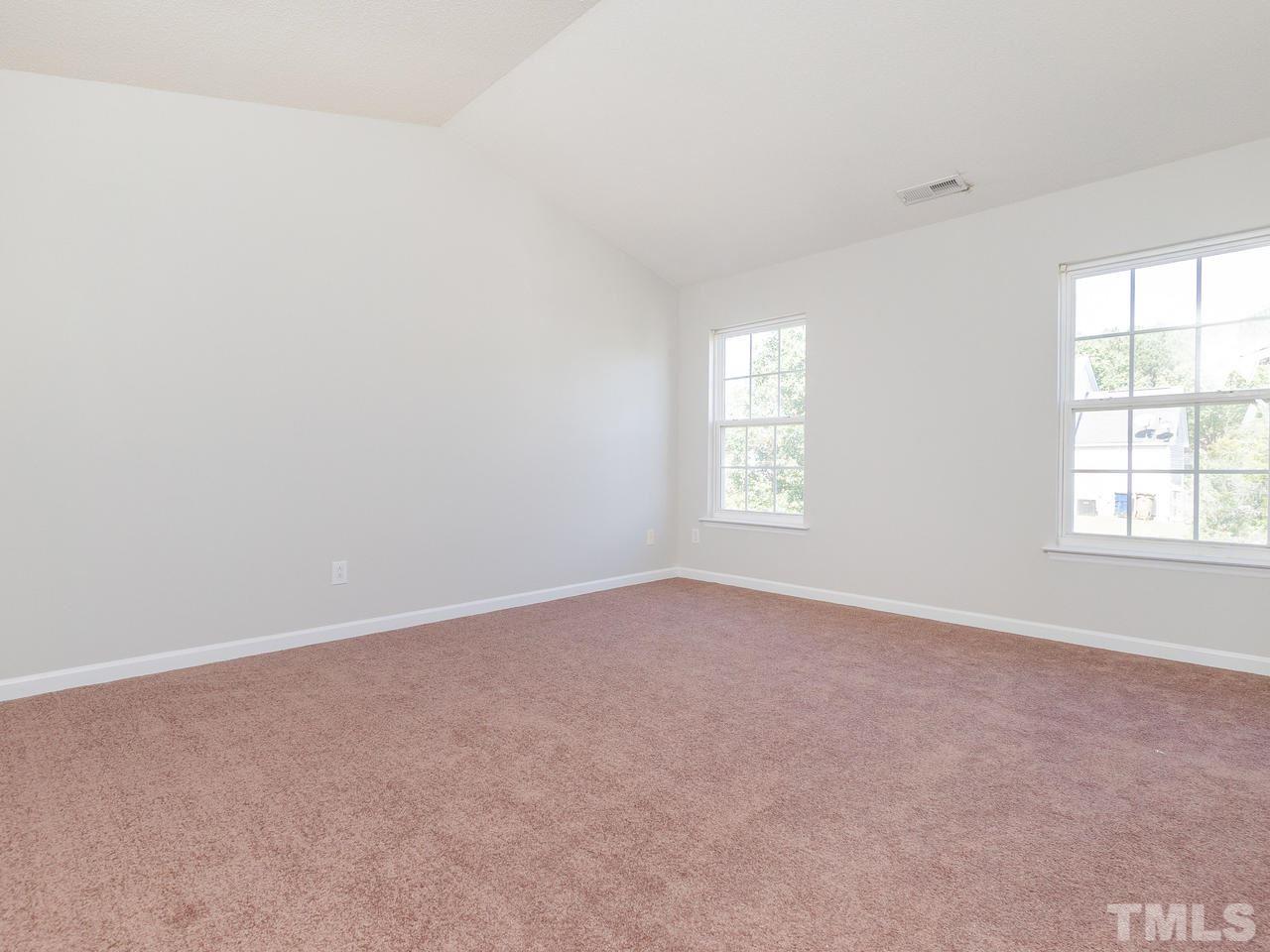 5801 Weddington Road Raleigh, NC 27610 - Photo 21 of 28 an empty room with windows
