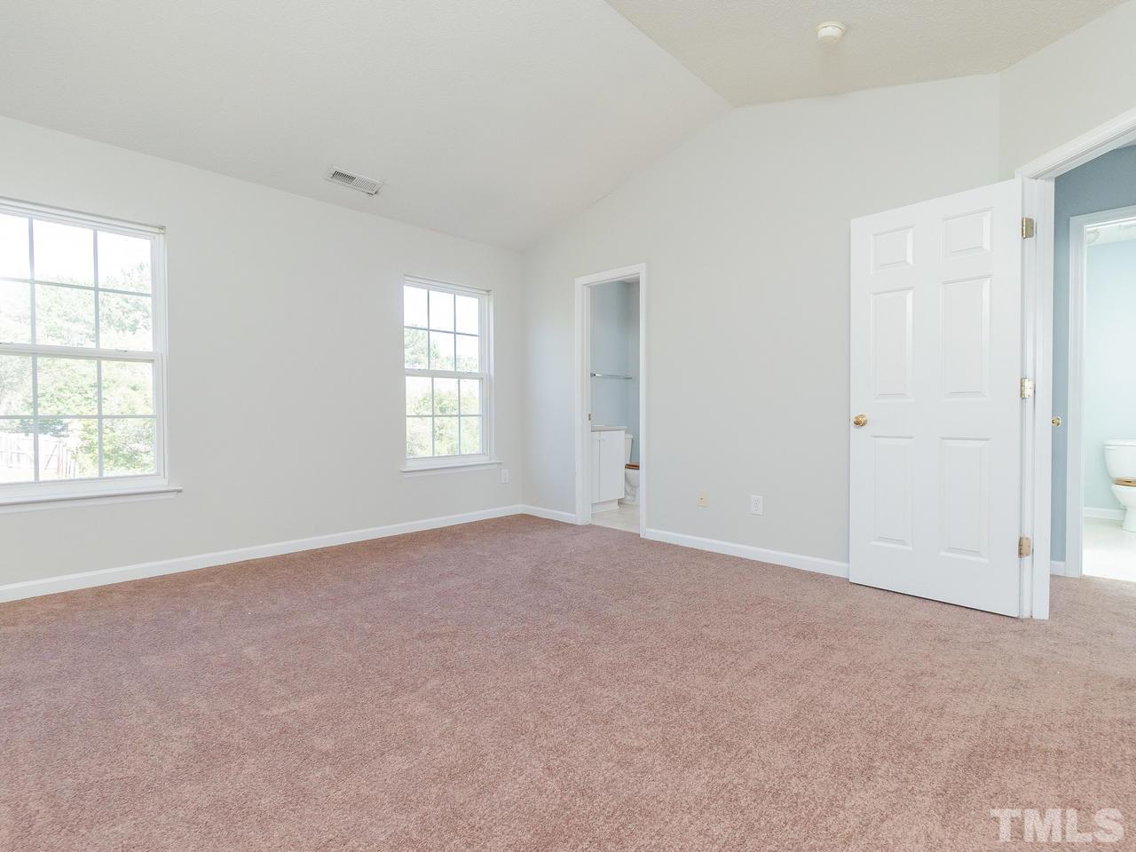 5801 Weddington Road Raleigh, NC 27610 - Photo 22 of 28 an empty room with windows