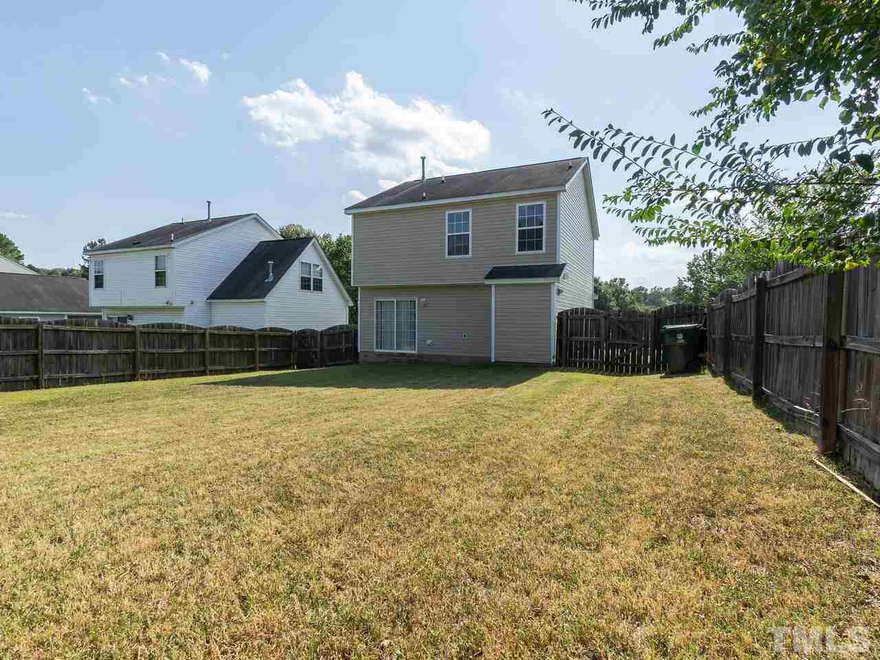 5801 Weddington Road Raleigh, NC 27610 - Photo 25 of 28 a house view with a backyard space