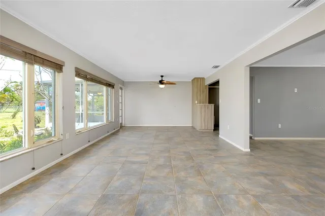 a kitchen with a refrigerator and a sink