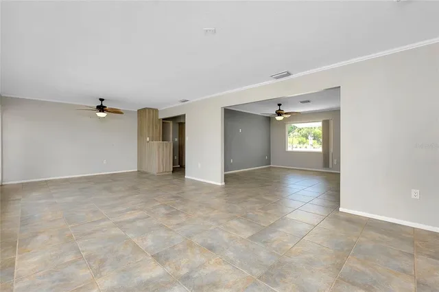a kitchen with a refrigerator a sink and a stove