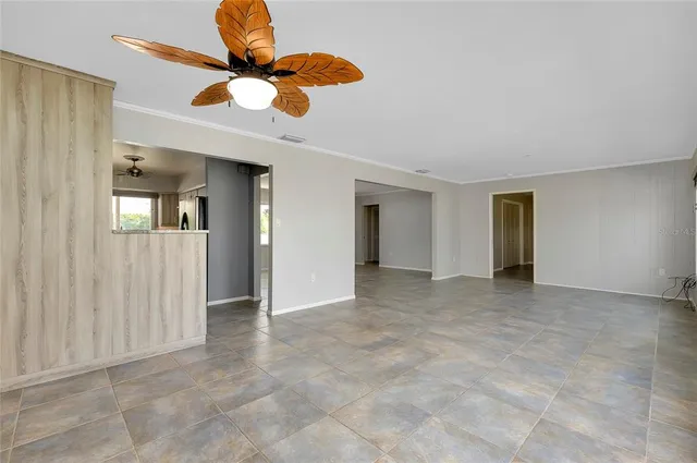 a view of a kitchen with electric appliances