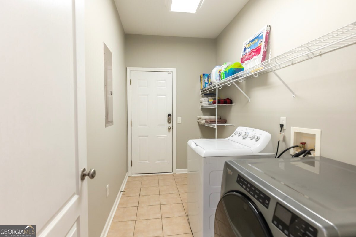 135 Runs Crossing Drive Springfield, GA 31329 - Photo 18 of 38 a utility room with dryer and washer