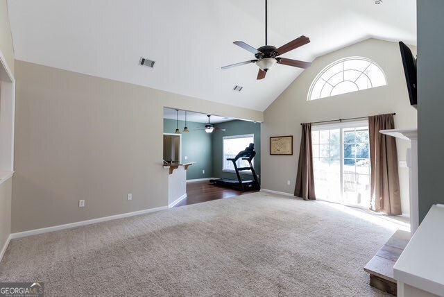 135 Runs Crossing Drive Springfield, GA 31329 - Photo 10 of 38 a view of a livingroom with a ceiling fan and window