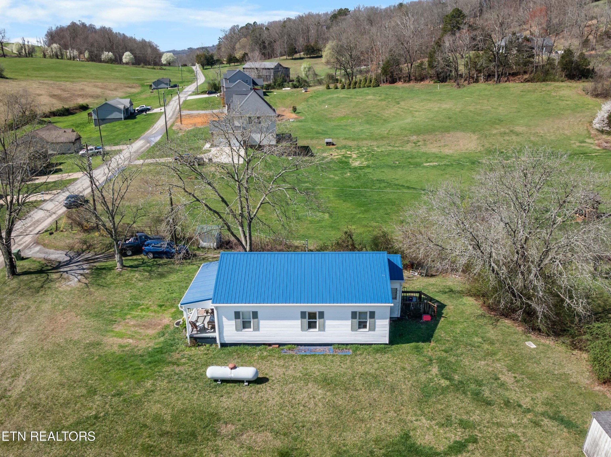 385 Hubbs Grove Road Maynardville, TN 37807 - Photo 29 of 33 a aerial view of a house with pool and a fountain
