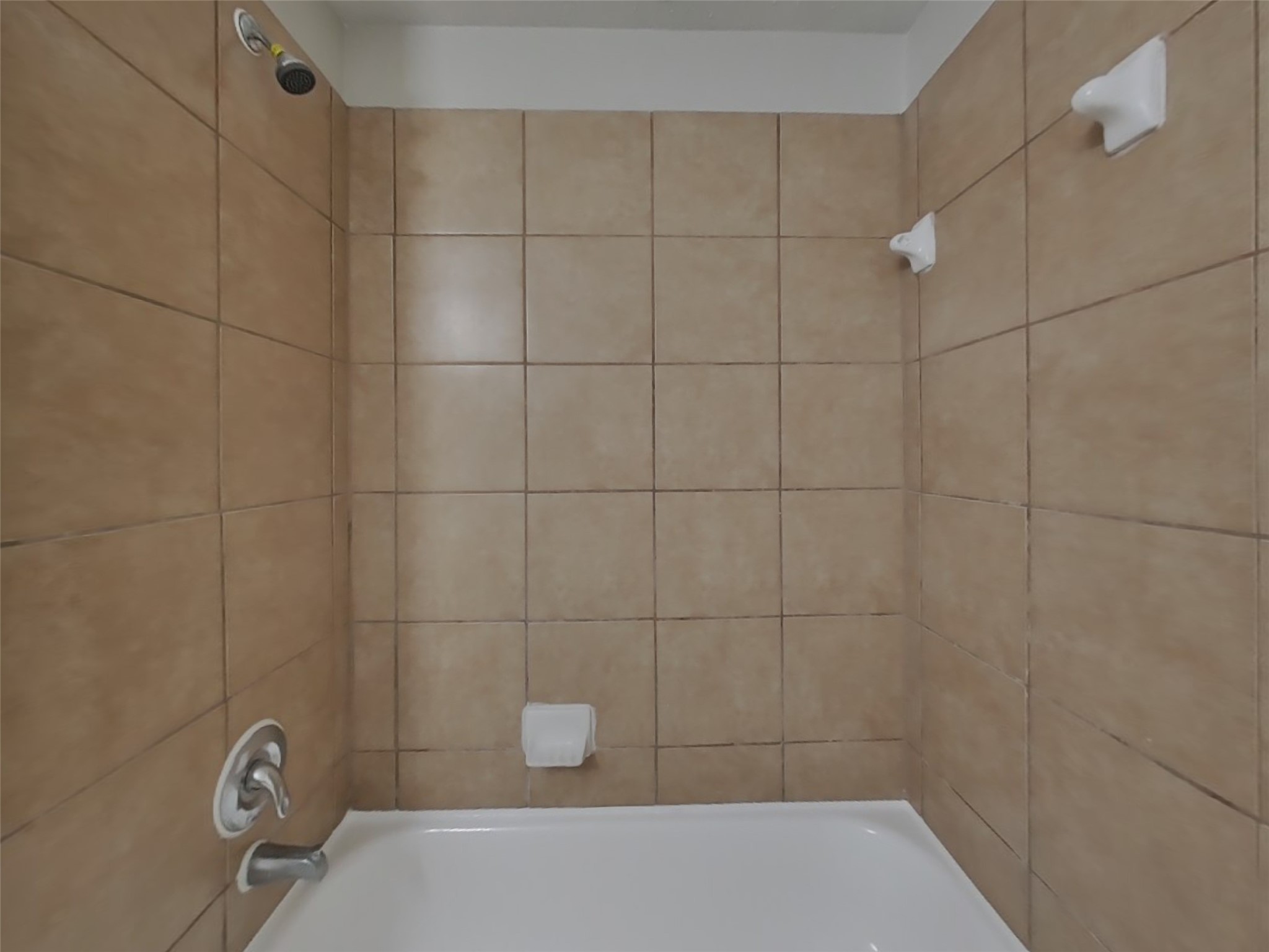 21526 Lovis Way Humble, TX 77338 - Photo 14 of 17 a bathroom with a shower
