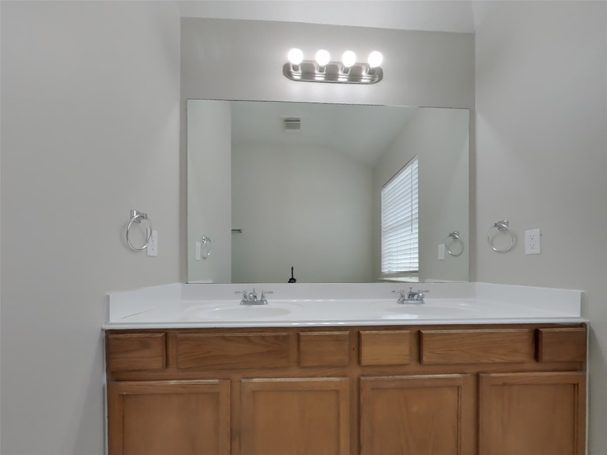 21526 Lovis Way Humble, TX 77338 - Photo 8 of 17 a bathroom with a sink and a mirror