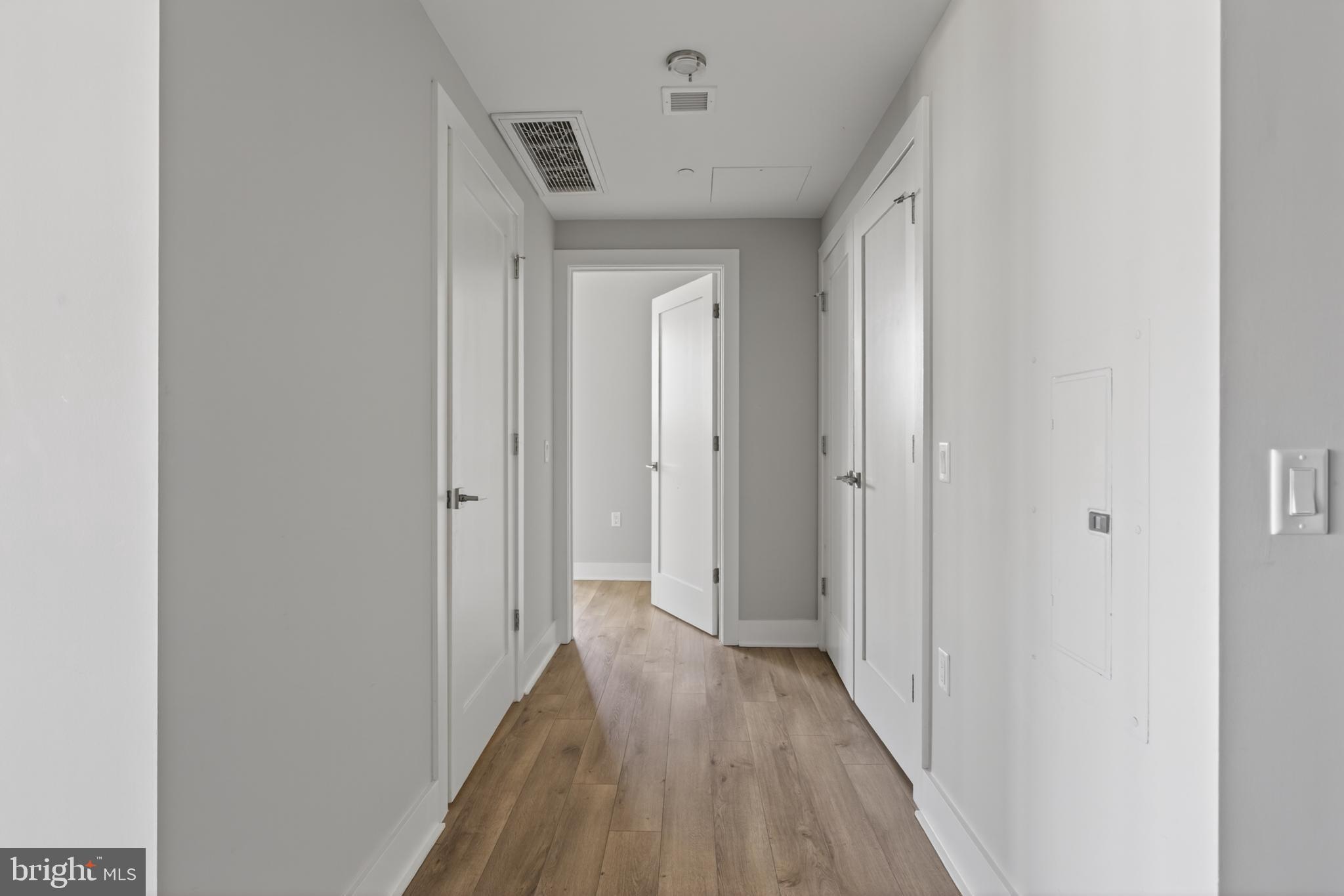 88 V Street Southwest, Unit PH3 Washington, DC 20024 - Photo 22 of 49 a view of a hallway with wooden floor