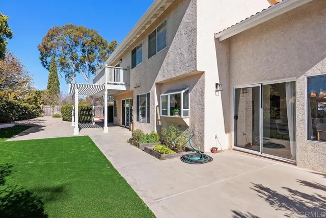 a view of a building with a yard