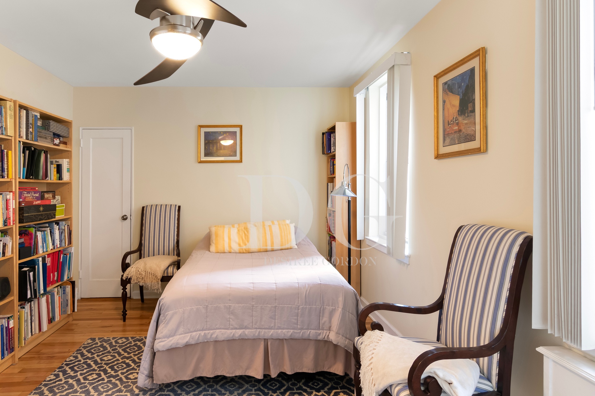 36 Dahill Road, Unit 2I Brooklyn, NY 11218 - Photo 4 of 9 a bedroom with a bed furniture and a book shelf