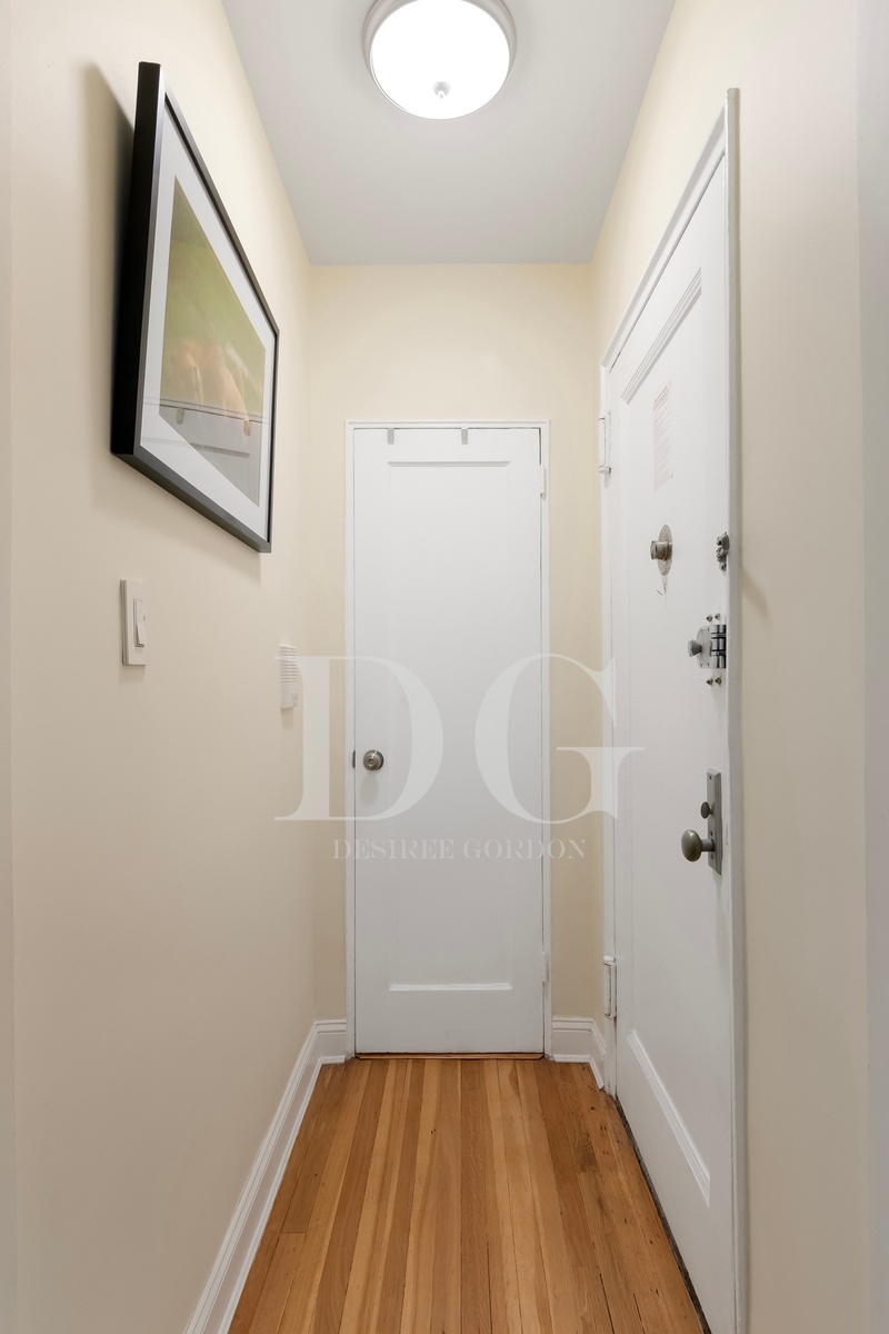 36 Dahill Road, Unit 2I Brooklyn, NY 11218 - Photo 7 of 9 a bathroom with a vanity and a shower