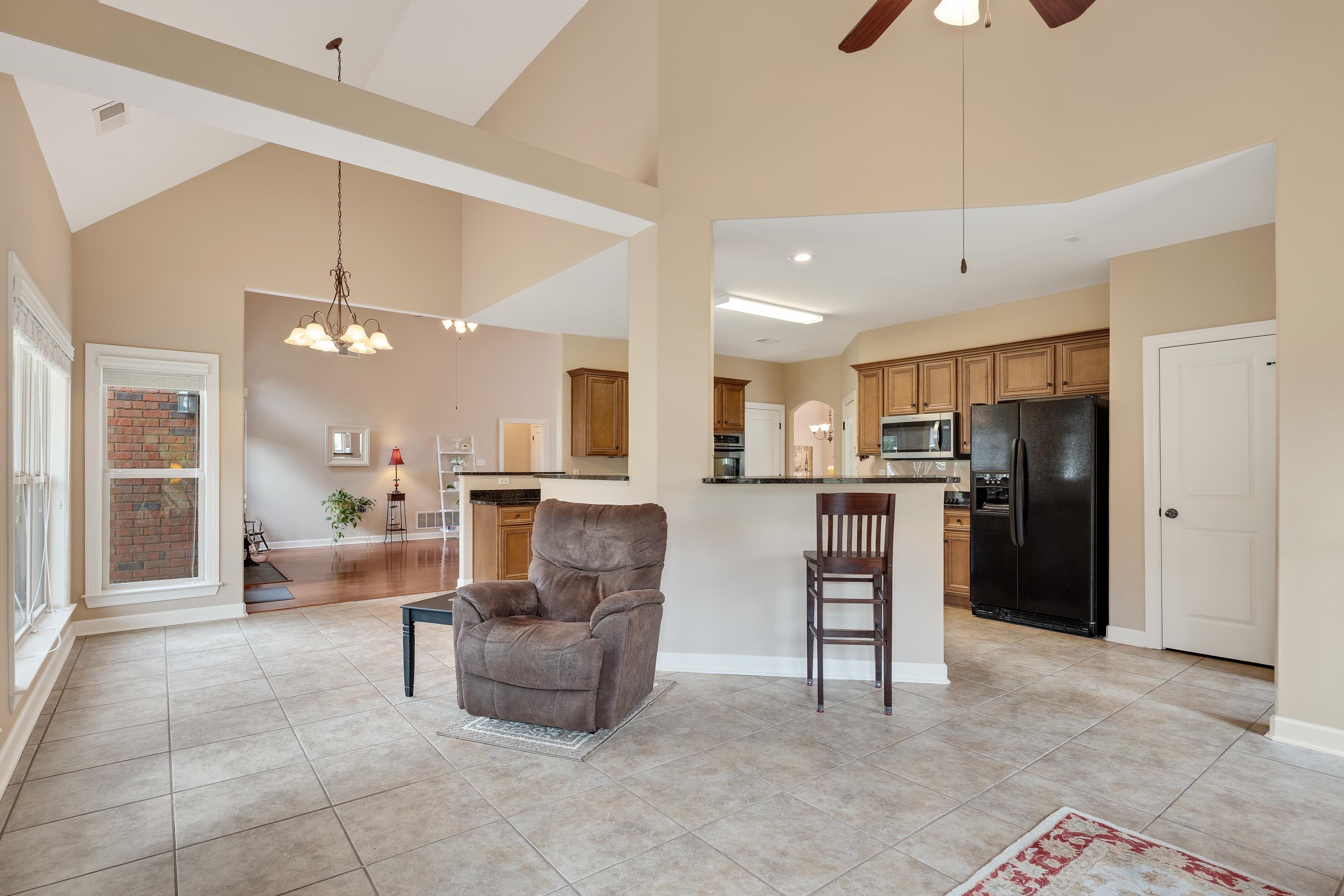 90 Rolling Meadows Road Somerville, TN 38068 - Photo 13 of 37 a view of kitchen with furniture and refrigerator