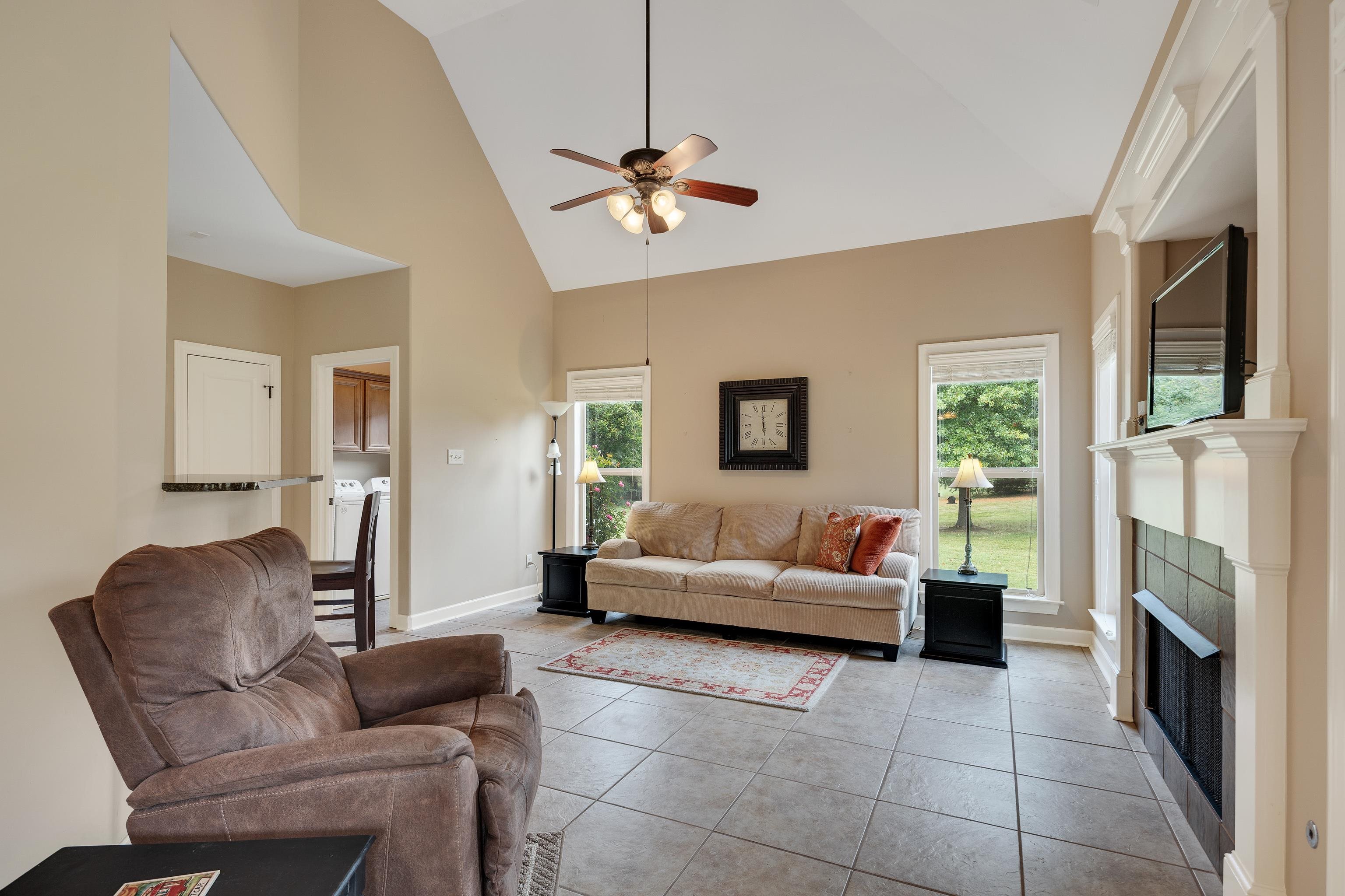 90 Rolling Meadows Road Somerville, TN 38068 - Photo 15 of 37 a living room with furniture and a fireplace