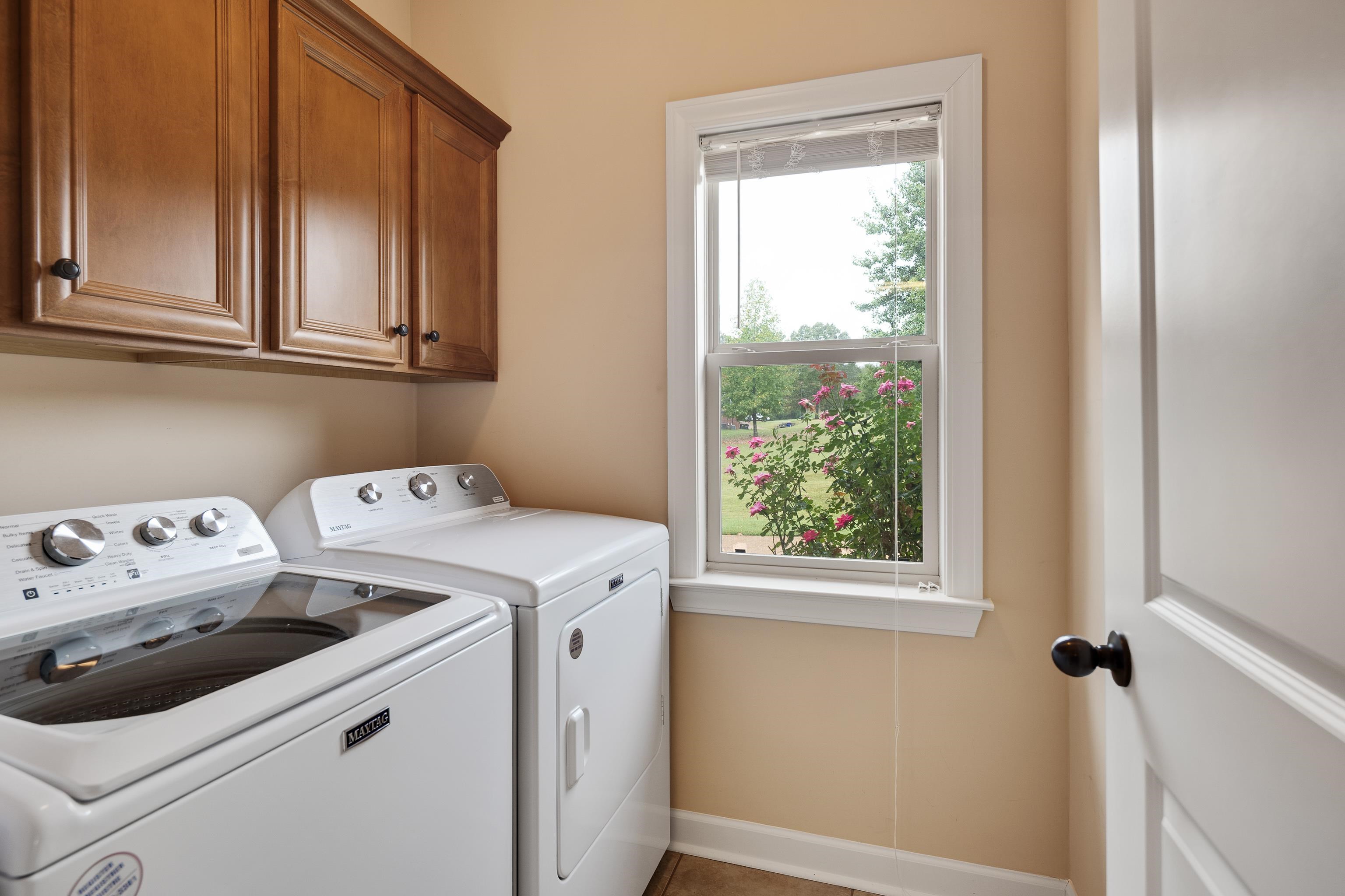 90 Rolling Meadows Road Somerville, TN 38068 - Photo 17 of 37 a utility room with dryer and washer