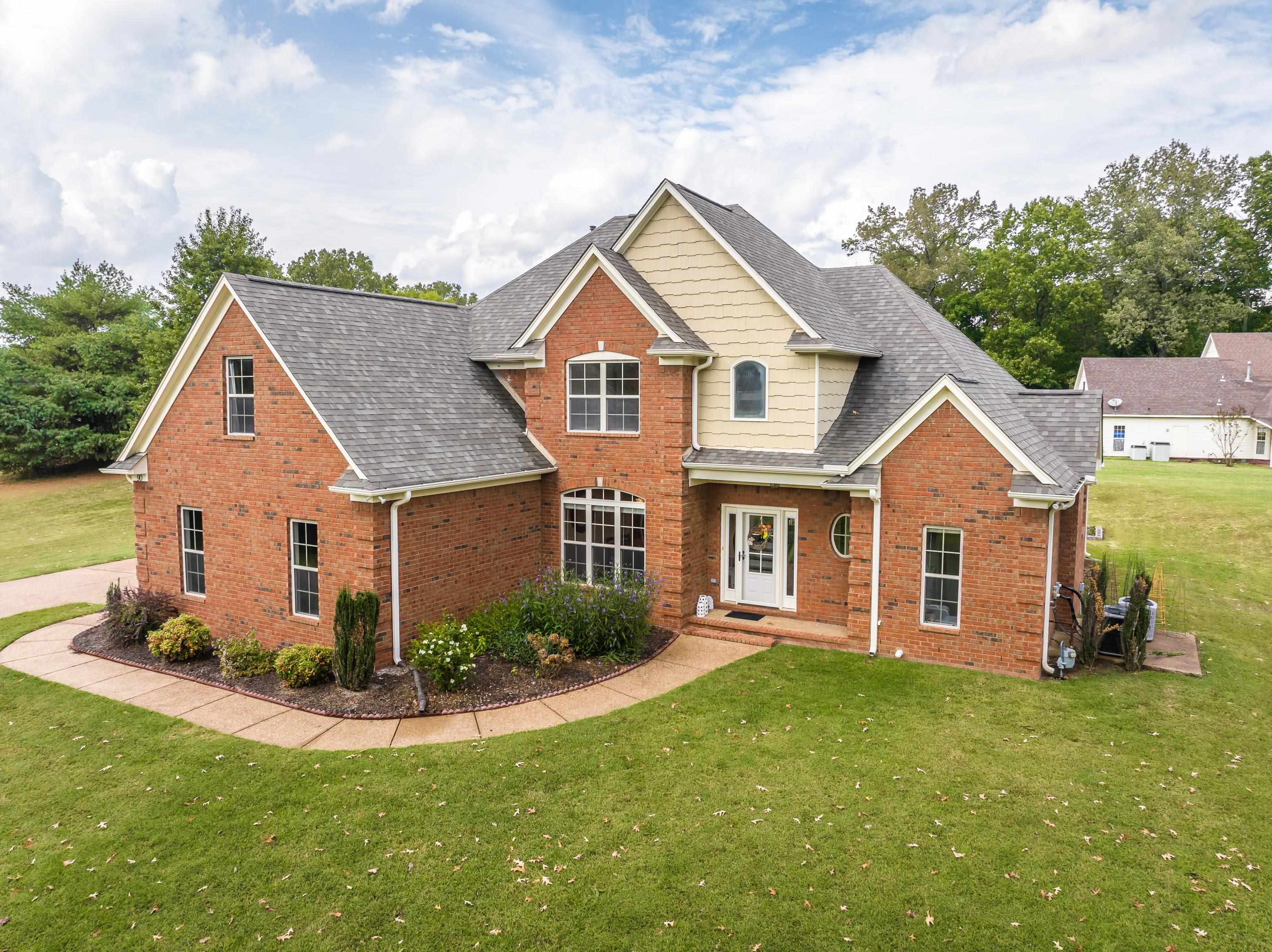 90 Rolling Meadows Road Somerville, TN 38068 - Photo 4 of 37 a front view of house with yard and green space