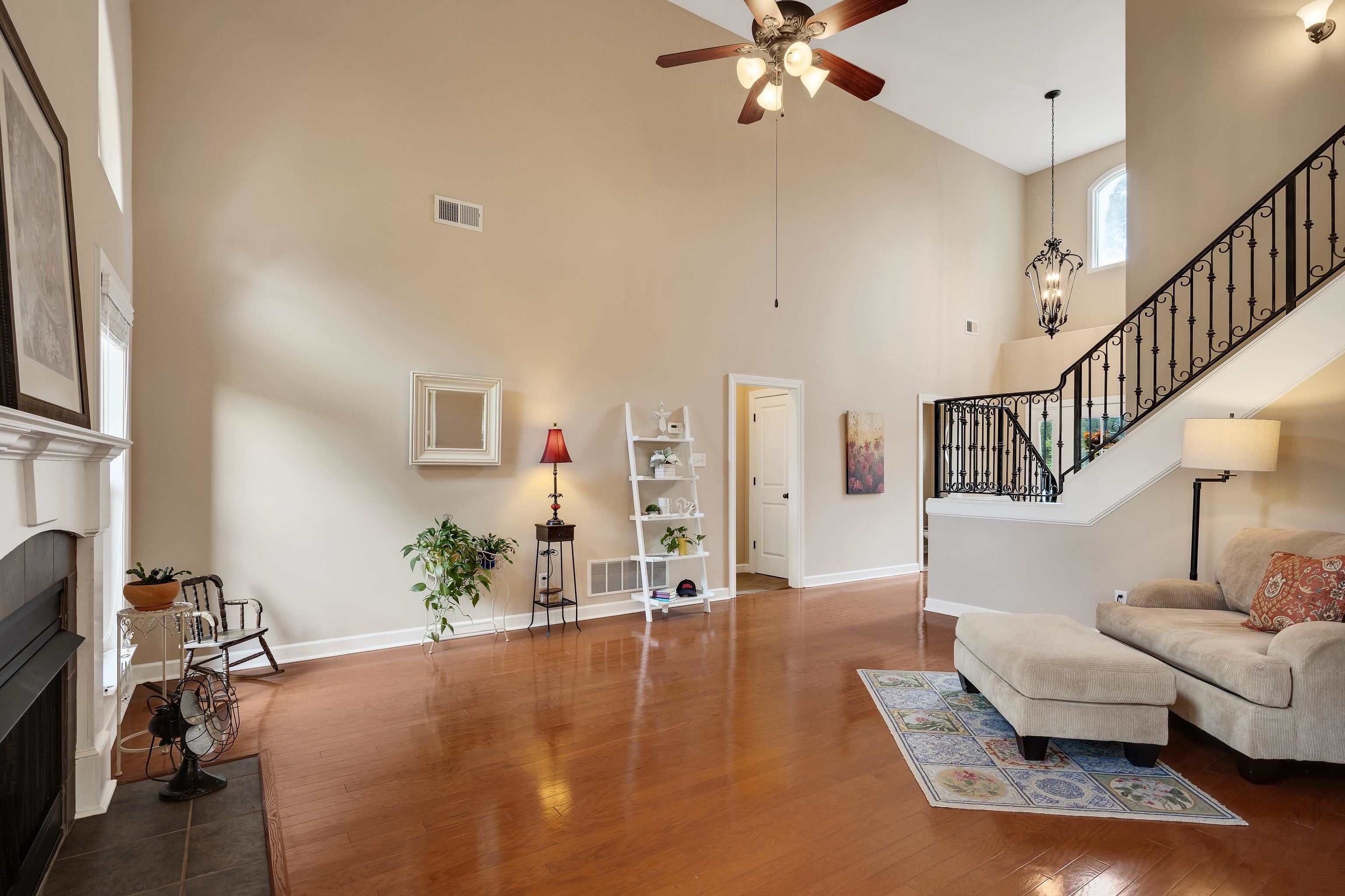 90 Rolling Meadows Road Somerville, TN 38068 - Photo 10 of 37 a living room with furniture and a chandelier