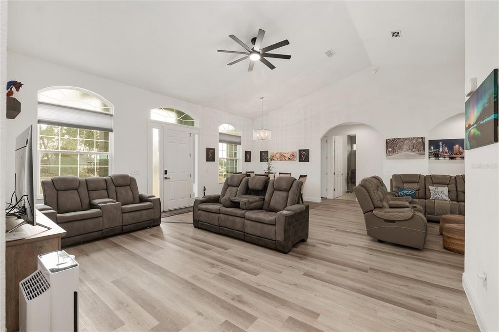 4321 Southwest 106th Place Ocala, FL 34476 - Photo 14 of 82 a living room with furniture kitchen view and a large window