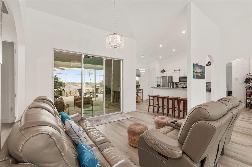 4321 Southwest 106th Place Ocala, FL 34476 - Photo 19 of 82 a living room with furniture and a large window