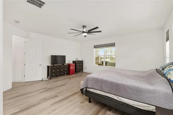 a bathroom with a shower and toilet