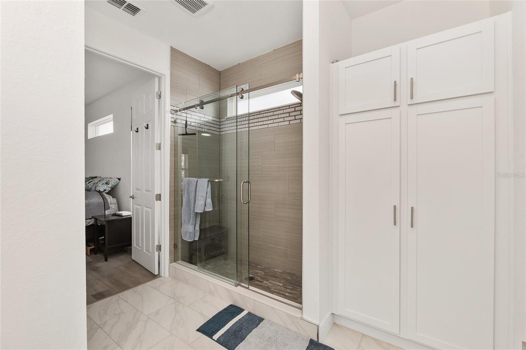 4321 Southwest 106th Place Ocala, FL 34476 - Photo 36 of 82 a bathroom with a shower and a toilet