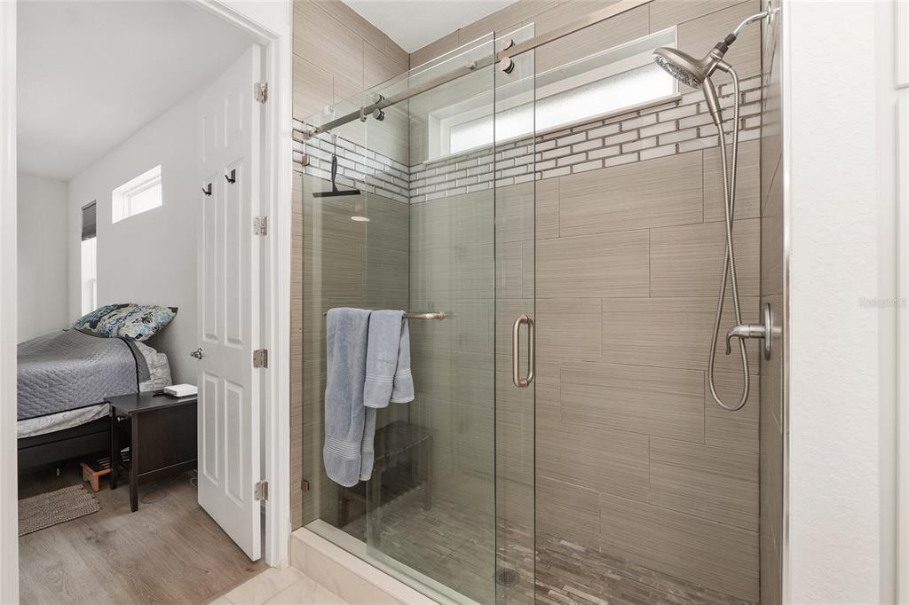 4321 Southwest 106th Place Ocala, FL 34476 - Photo 37 of 82 a bathroom with a shower and a sink