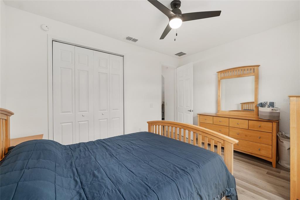 4321 Southwest 106th Place Ocala, FL 34476 - Photo 40 of 82 a bedroom with a bed and a dresser