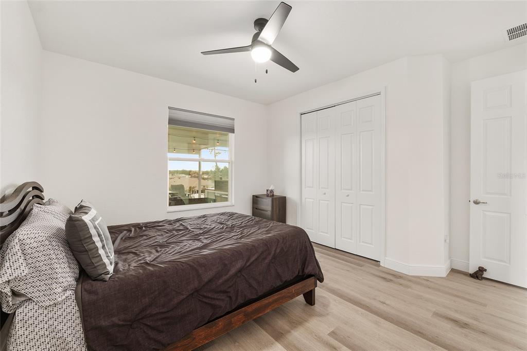 4321 Southwest 106th Place Ocala, FL 34476 - Photo 45 of 82 a bedroom with a bed and a window