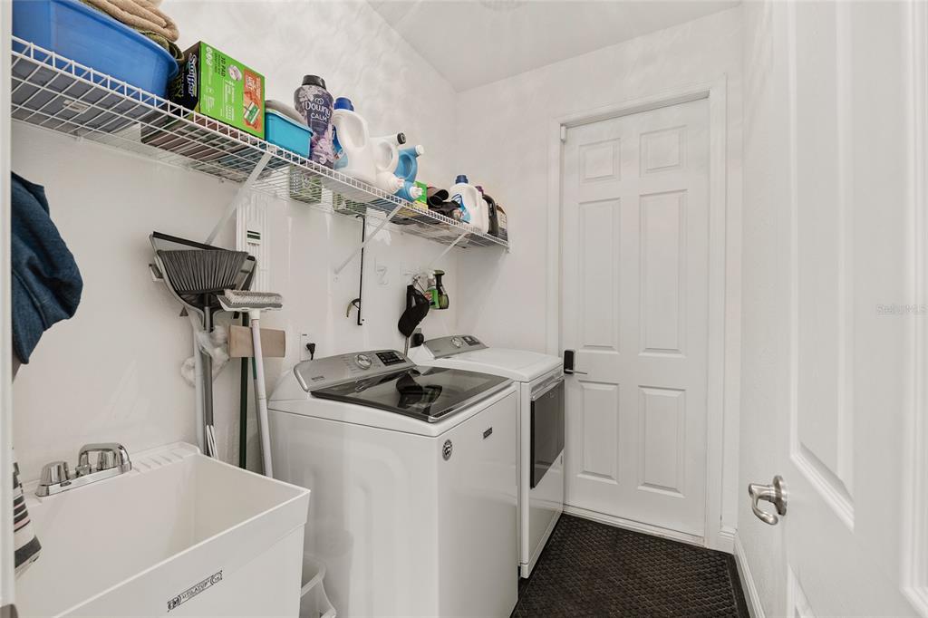 4321 Southwest 106th Place Ocala, FL 34476 - Photo 47 of 82 a kitchen with a sink and cabinets