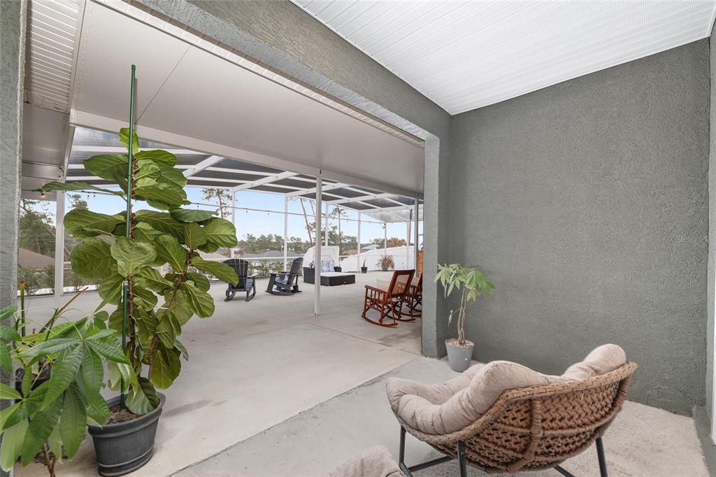 4321 Southwest 106th Place Ocala, FL 34476 - Photo 50 of 82 a outdoor living space with furniture