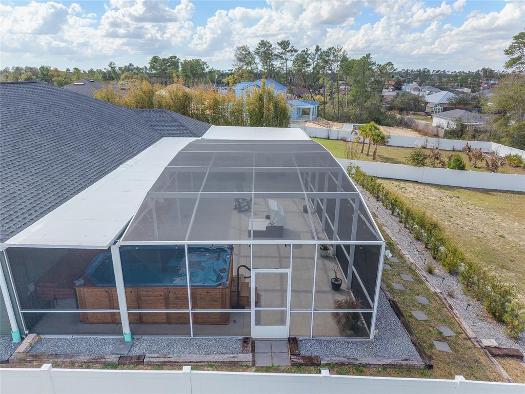 4321 Southwest 106th Place Ocala, FL 34476 - Photo 76 of 82 a view of a swimming pool with a lake view