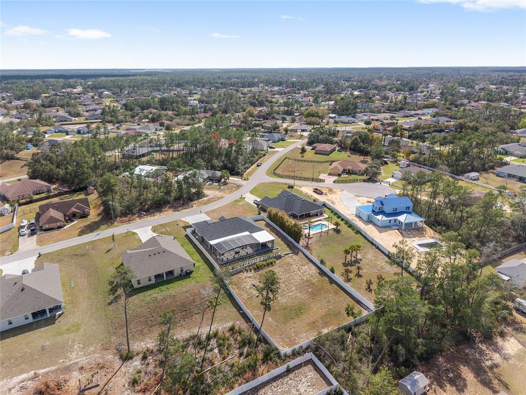 4321 Southwest 106th Place Ocala, FL 34476 - Photo 80 of 82 an aerial view of residential houses with outdoor space