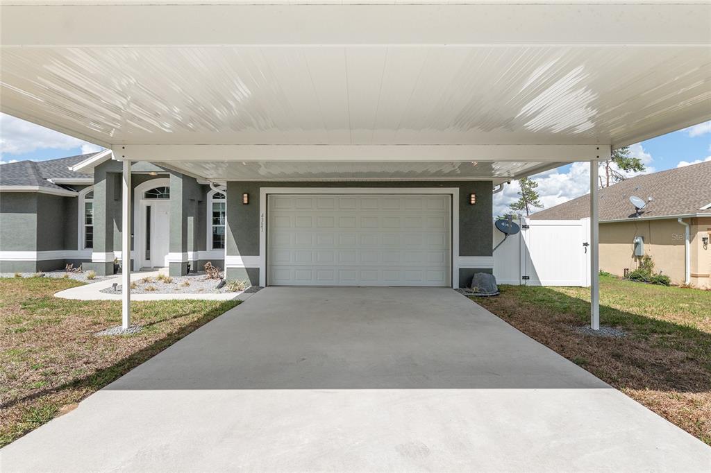 4321 Southwest 106th Place Ocala, FL 34476 - Photo 9 of 82 a view of a house with a patio