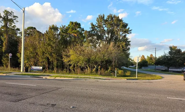 a view of a playground with basketball court