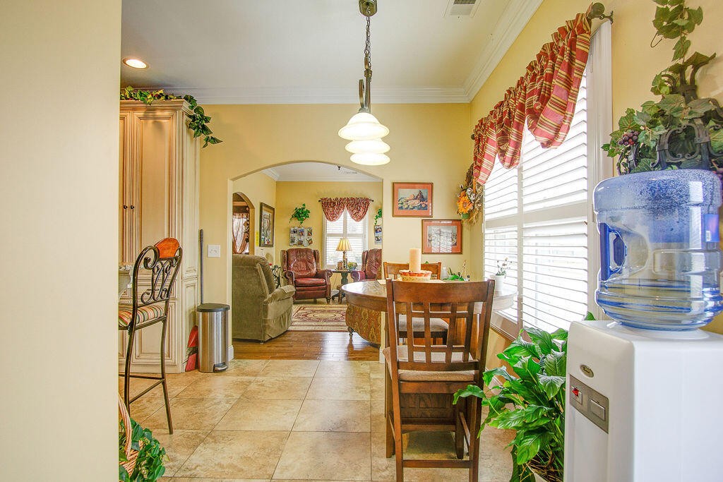 734 Bryant Road Cohutta, GA 30710 - Photo 18 of 42 a dining room filled with furniture and a chandelier