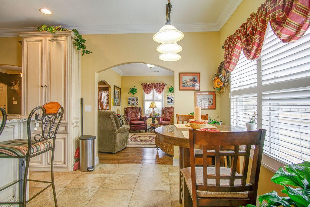 734 Bryant Road Cohutta, GA 30710 - Photo 19 of 42 a view of a dining room with furniture and chandelier