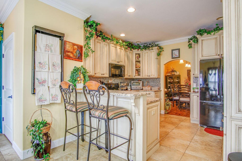 734 Bryant Road Cohutta, GA 30710 - Photo 20 of 42 a view of a kitchen with furniture and chandelier