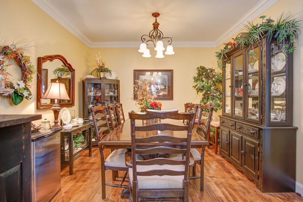 734 Bryant Road Cohutta, GA 30710 - Photo 24 of 42 a view of a dining room with furniture and a chandelier