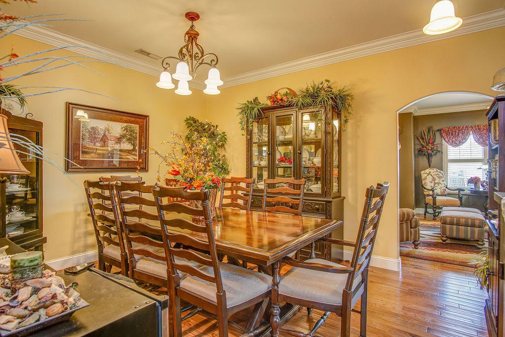 734 Bryant Road Cohutta, GA 30710 - Photo 26 of 42 a view of a dining room with furniture and wooden floor