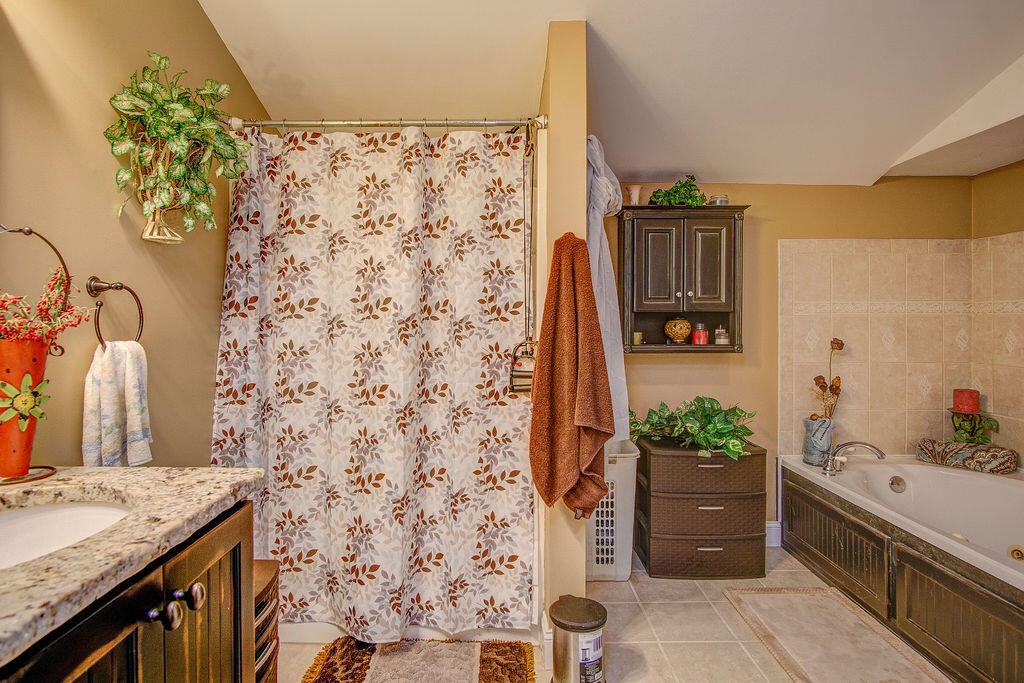 734 Bryant Road Cohutta, GA 30710 - Photo 30 of 42 a bathroom with a granite countertop sink and a mirror