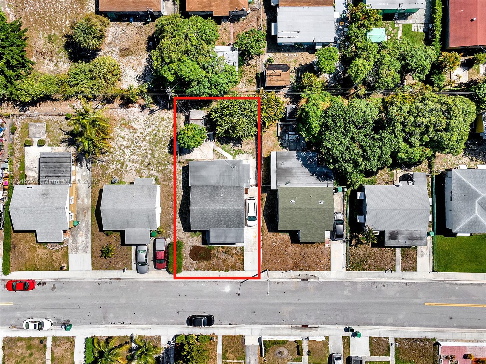 633 West 3rd Street Riviera Beach, FL 33404 - Photo 8 of 52 an aerial view of houses with outdoor space