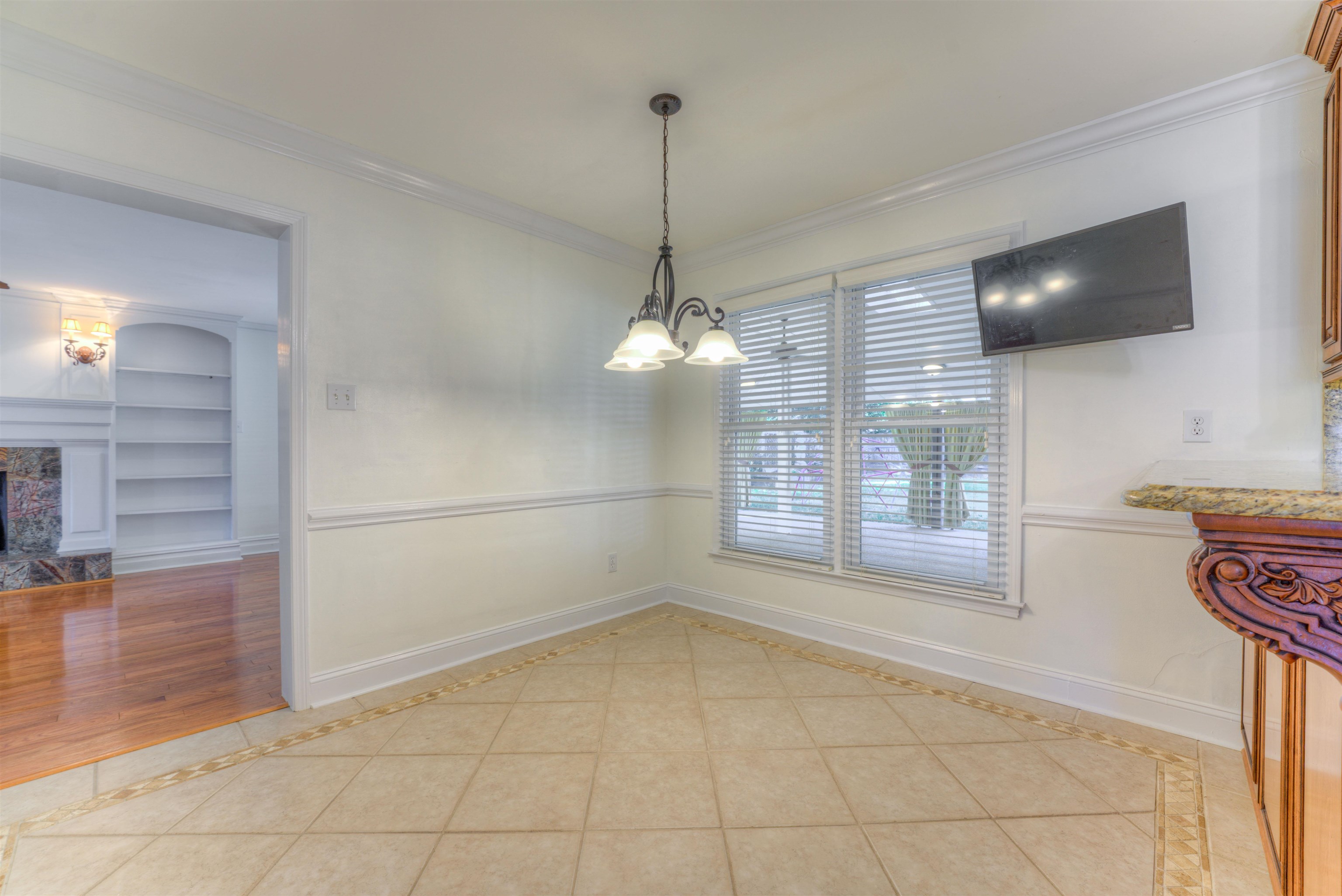 3385 Beaver Run Drive Collierville, TN 38017 - Photo 9 of 29 a view of empty room with wooden floor and fan