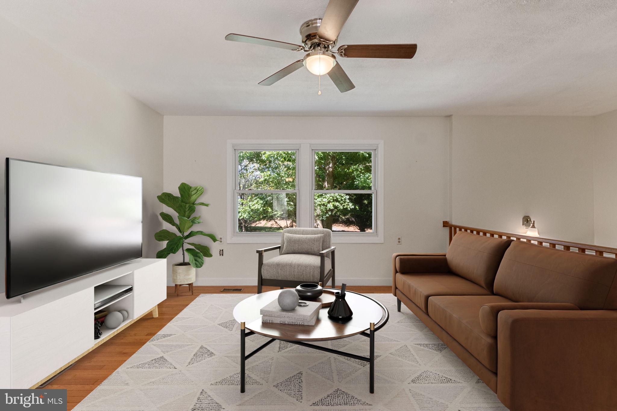 6035 Towles Mill Road Partlow, VA 22534 - Photo 4 of 66 a living room with furniture and a flat screen tv