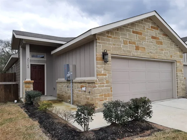 a view of house with patio
