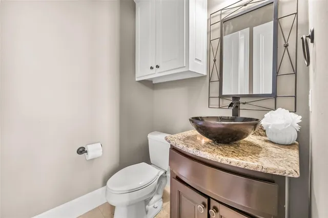 a living room with furniture flat screen tv and a fireplace