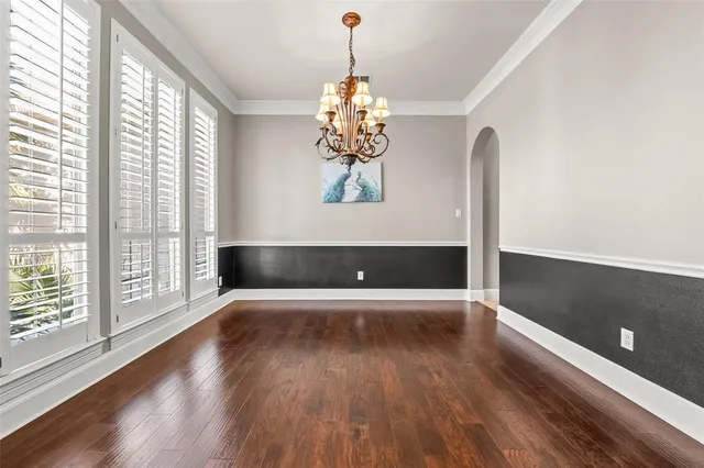 a view of livingroom with hardwood floor and hallway