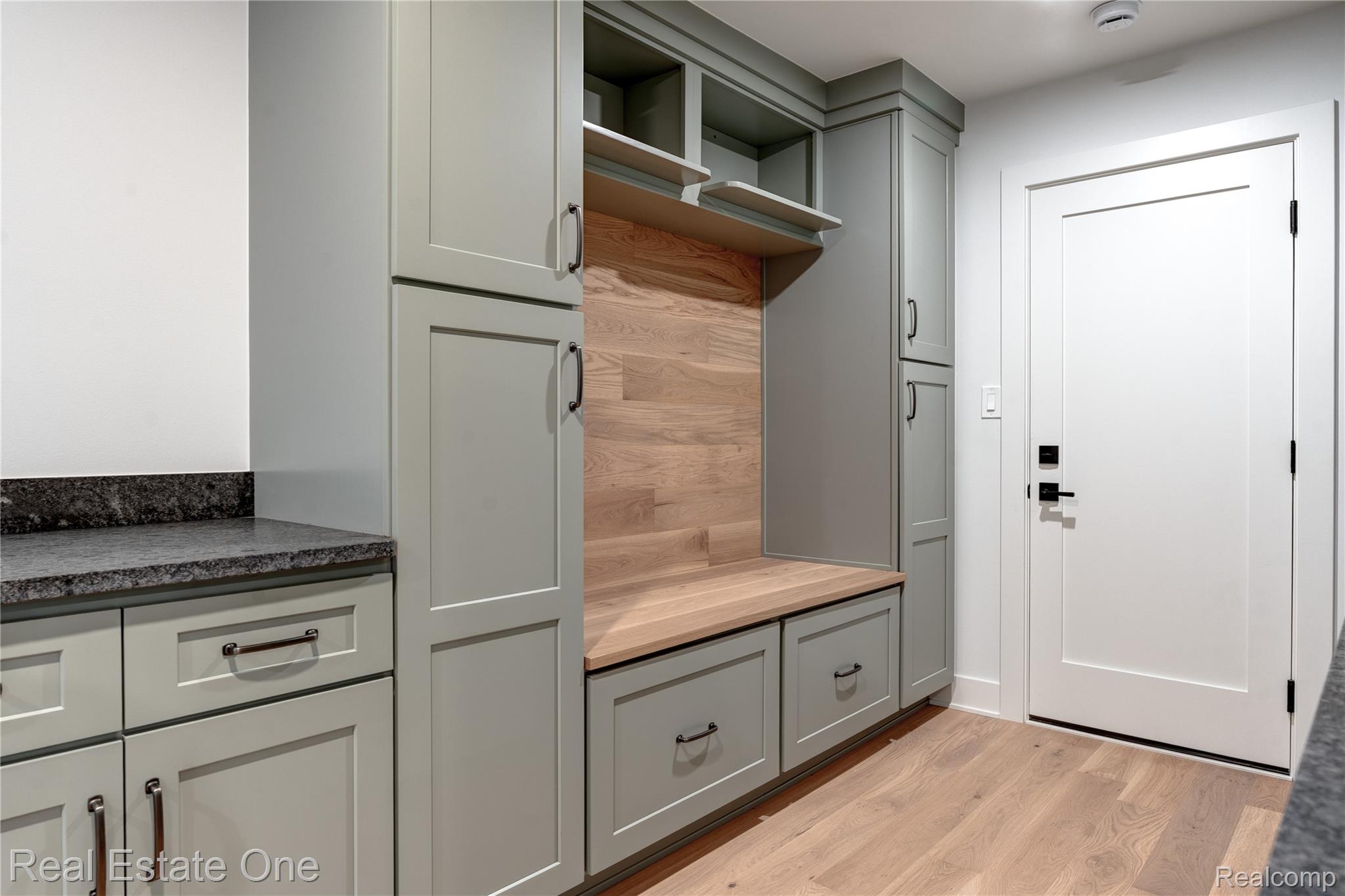 786 South Cranbrook Road Bloomfield Hills, MI 48301 - Photo 4 of 38 Mudroom featuring light wood-style flooring