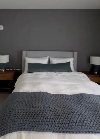a bedroom with a bed