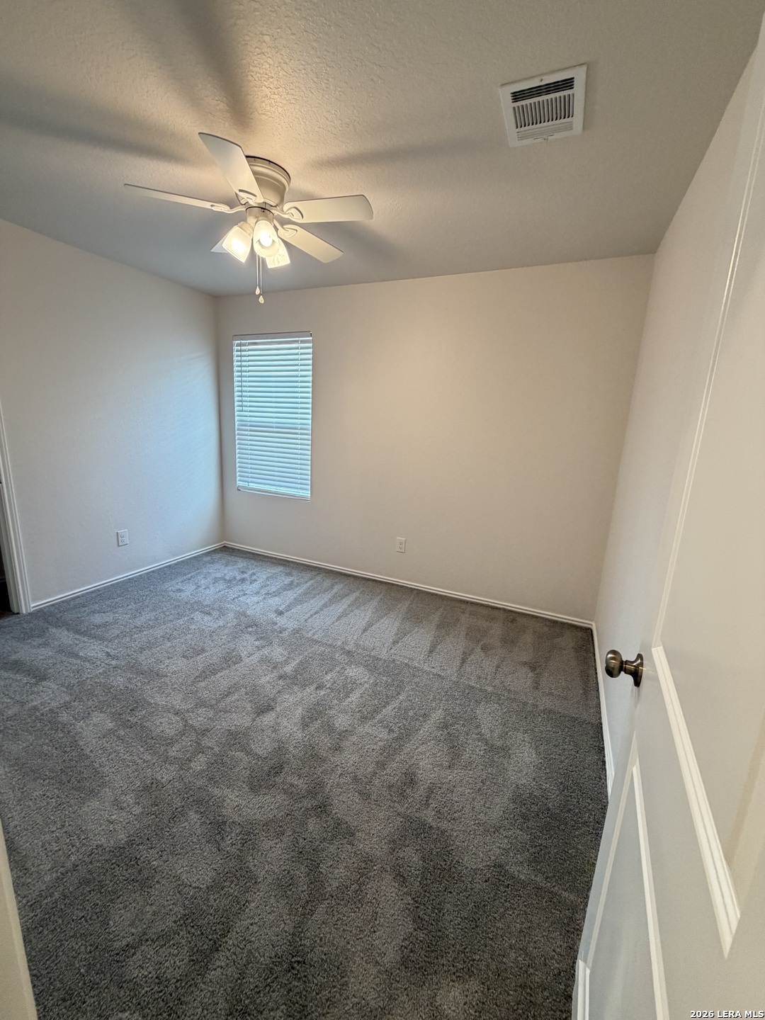12914 Chinali St. Hedwig, TX 78152 - Photo 14 of 27 a view of an empty room with a window
