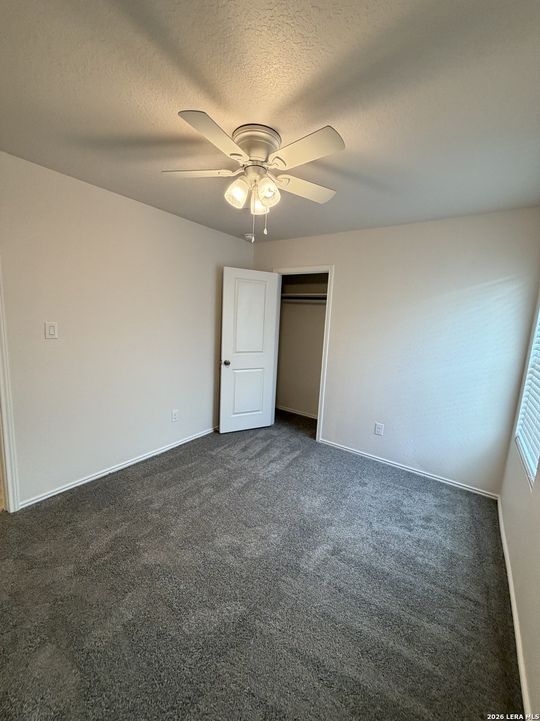 12914 Chinali St. Hedwig, TX 78152 - Photo 15 of 27 a view of an empty room and a ceiling fan