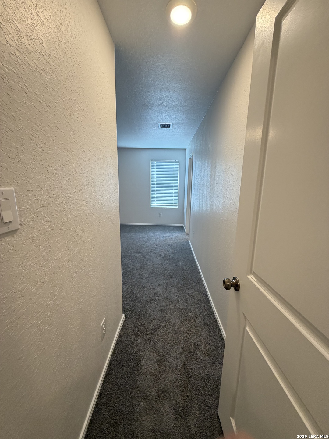 12914 Chinali St. Hedwig, TX 78152 - Photo 18 of 27 view of a room with door